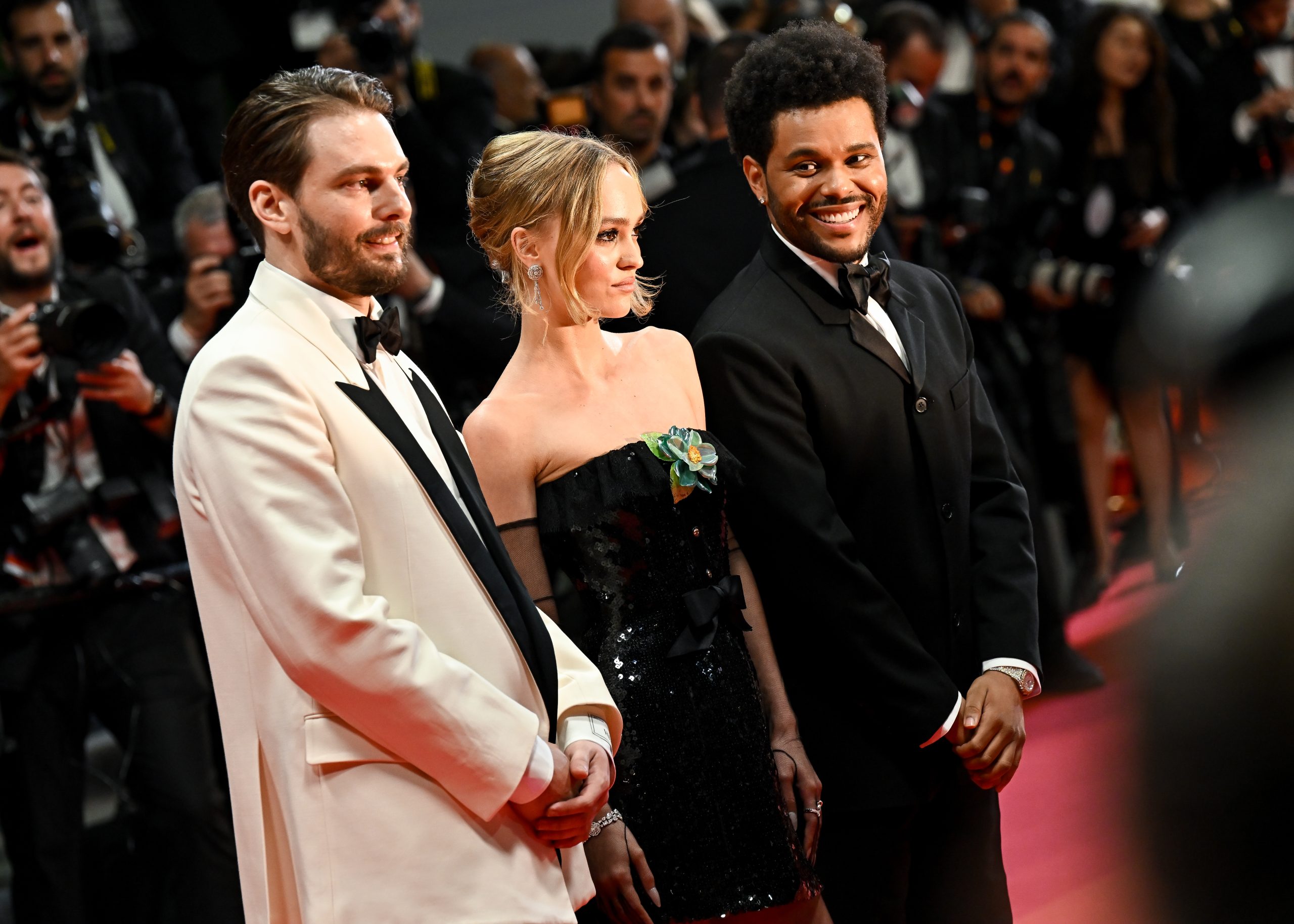 Sam Levinson, Lily-Rose Depp and Abel “The Weeknd” Tesfaye at the "The Idol" Screening & Red Carpet at the 76th Cannes Film Festival held at the Palais des Festivals on May 22, 2023 in Cannes, France.